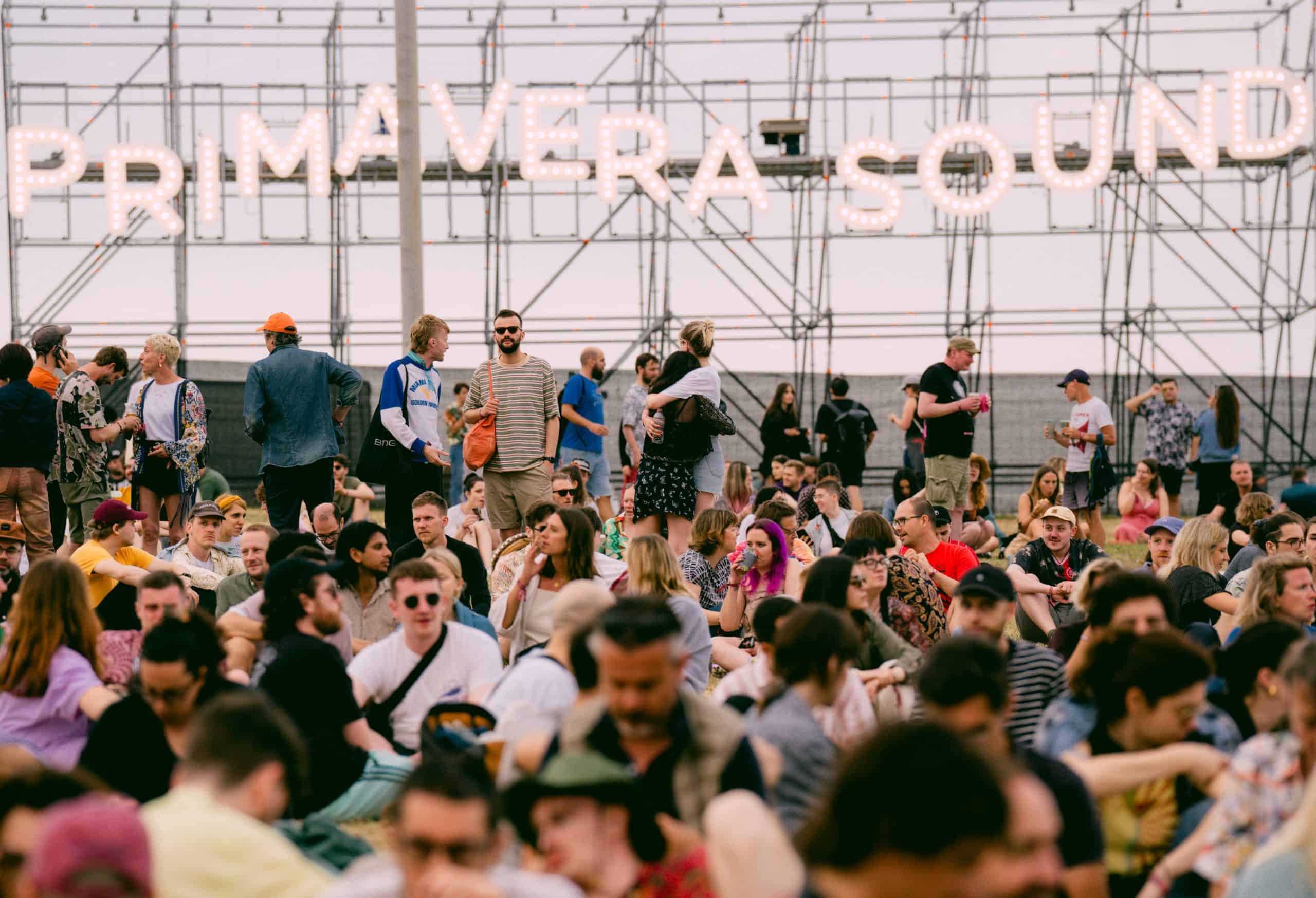 a huge crowd gathered under primavera sound sign