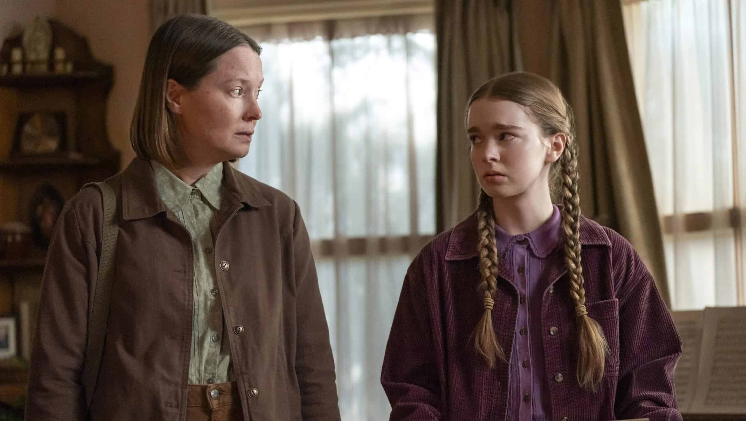 Samantha Sloyan and Summer H Lowell as Margaret and Carrie. They exchange worried looks.