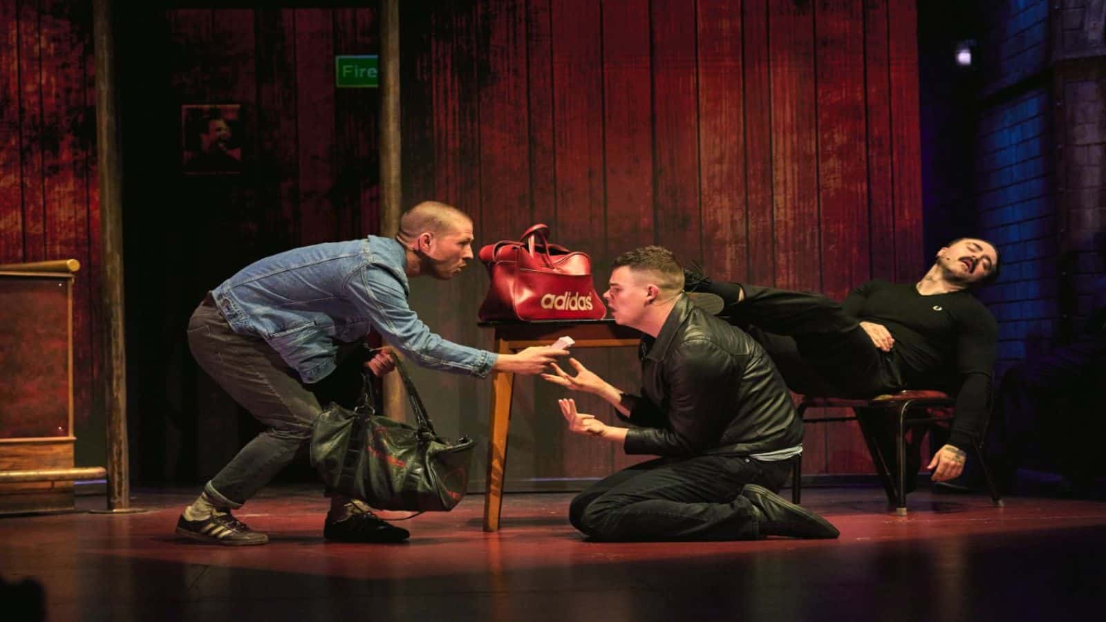 Rentboy and Spud in Trainspotting the Musical. 